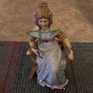 Vintage lady of the 1800’s figurine, made in Germany is numbered,